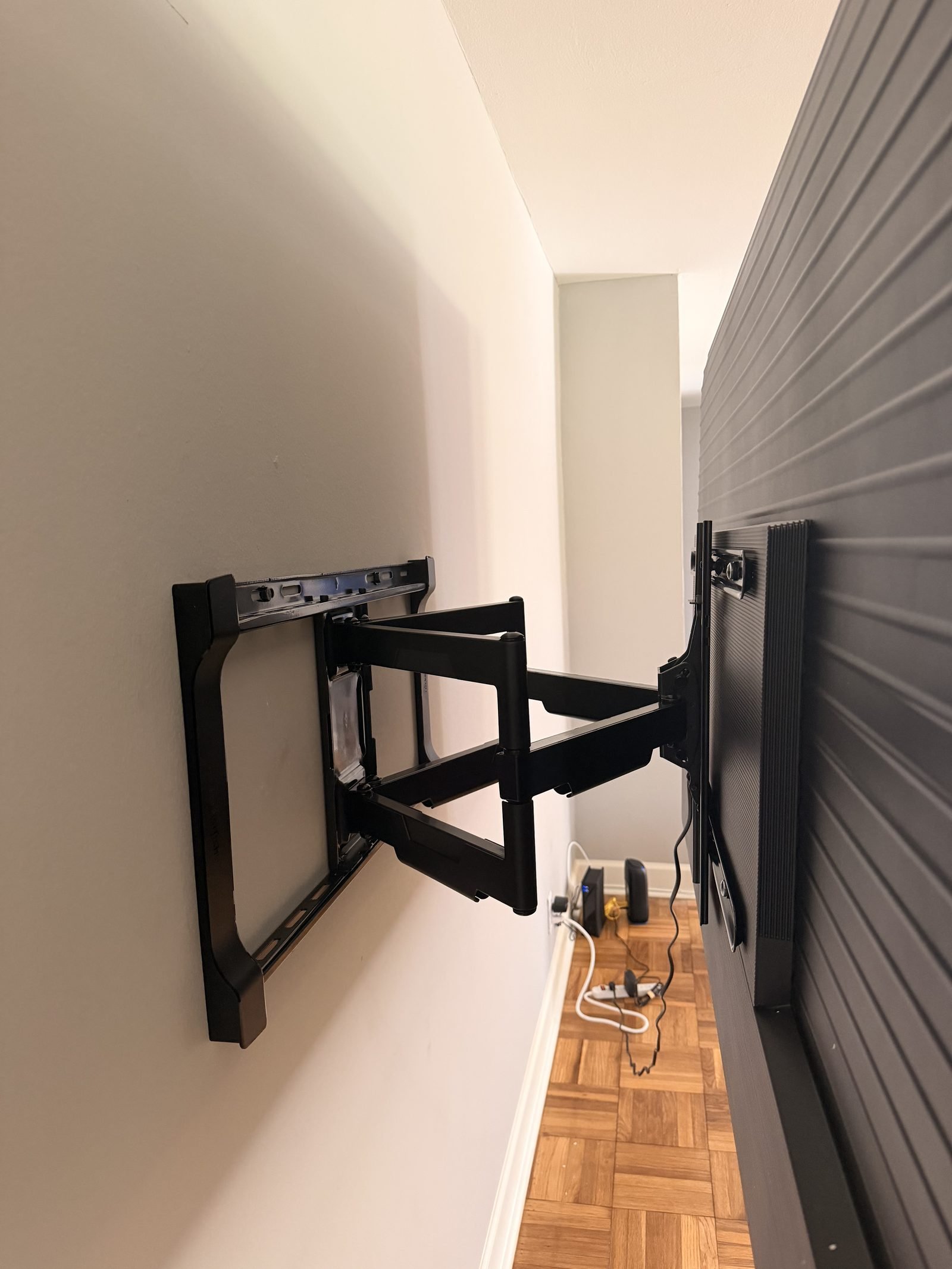 Full-motion TV mount fully extended showing articulating arm